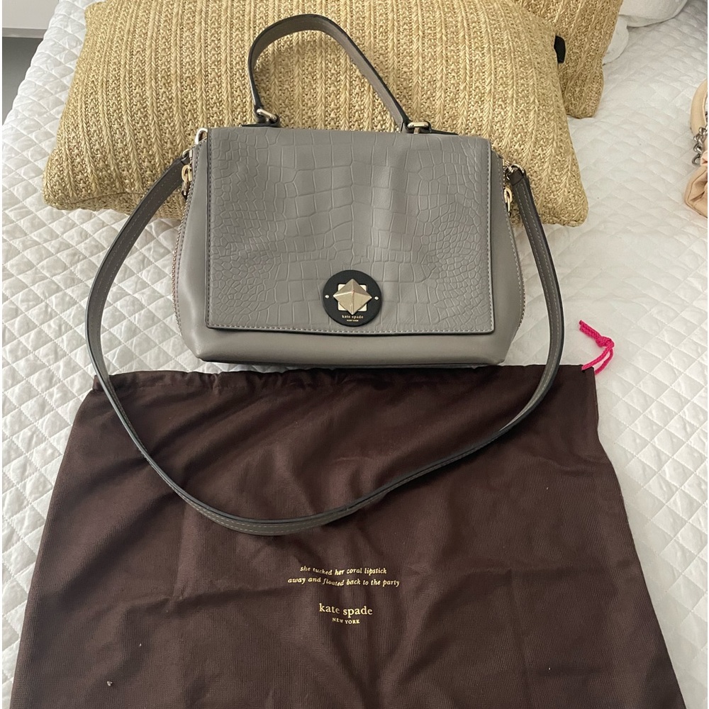 Women’s gray Kate spade Crossbody handbag w/ dust bag